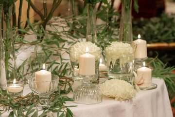 Festive table decoration with flowers and other elements