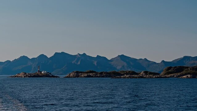 Ferry Cruise Featuring Skrova Lighthouse And Distant Peaks