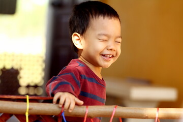 Happy  young boys playing hide and seek