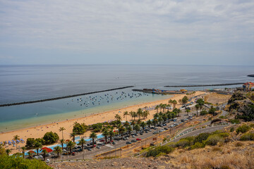 Colourful houses on a mountain in San Andrés, Canary Islands. Aerial view of Playa de Las Teresitas and San Andrés village in Tenerife, Spain