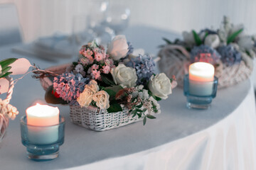 Festive table decoration with flowers and other elements