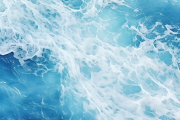Blue sea water with foam as a background. Close-up.