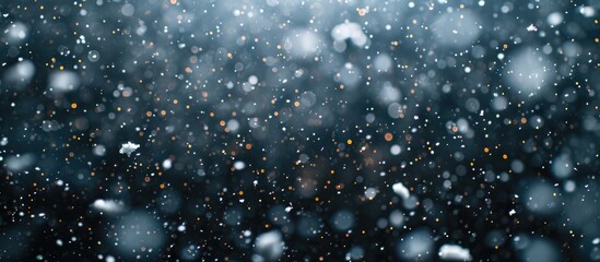 Snowstorm stock image with falling snow on black background. - obrazy, fototapety, plakaty
