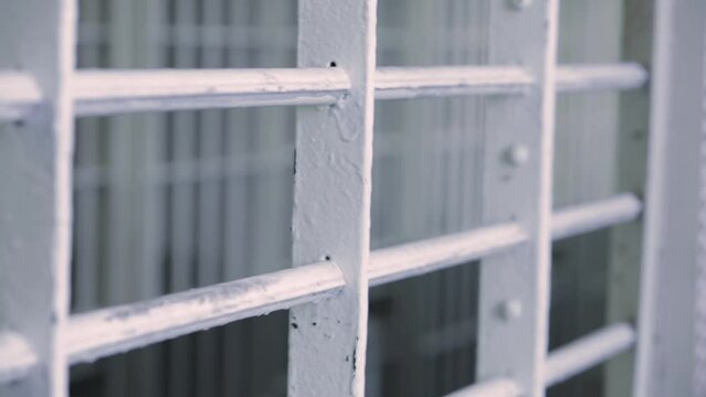prison cells behind bars