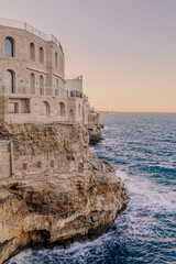 view of the walls of the city of Polignano a Mare, located on a slope on the Adriatic Sea widok na...