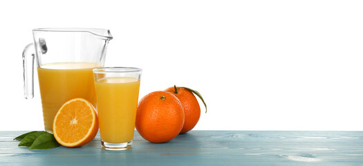 Delicious orange juice and fresh fruits on light blue wooden table against white background. Space for text