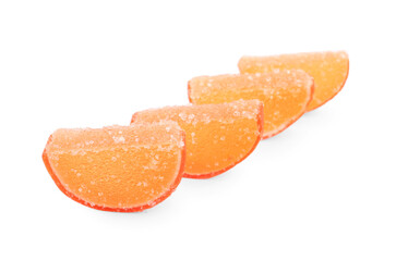Sweet orange jelly candies on white background
