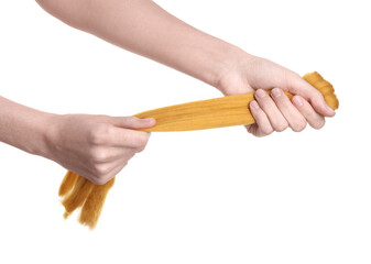 Woman holding orange felting wool on white background, closeup