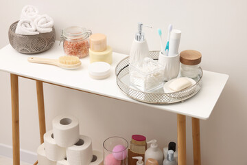 Different bath accessories and personal care products indoors