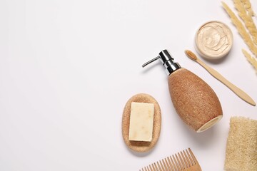 Bath accessories. Different personal care products and dry spikelets on white background, flat lay...
