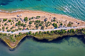 Aerial view of Halikounas beach (right next to lake Korission) a kitesurfers' "paradise" in Corfu island, Ionian sea, Greece.