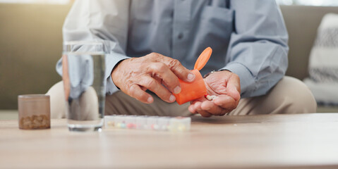 Hands, elderly person and pills on table with water, medicine for health and treatment for sick patient at home. Pharmaceutical drugs, supplements or antibiotics with daily routine for healthcare - obrazy, fototapety, plakaty