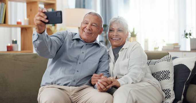 Senior couple, selfie and sofa with love, social media and happy together in a home. Retirement, marriage and profile picture with elderly people in a house on a website online with support and trust