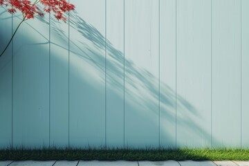 Blue wall with a shadow of a Japanese maple tree. Isolated on a blue background.
