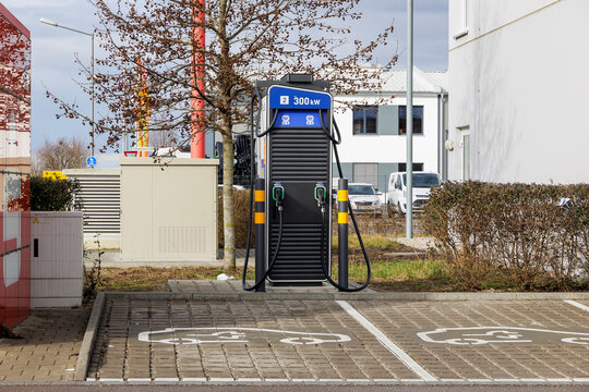 Electric car fast charging station with 300KW output and two connections at a motorway service area in Germany, Derching near Augsburg, 14 February 2024