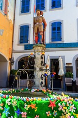Festive decorations for Easter holiday on the fountain in Nyon, Switzerland