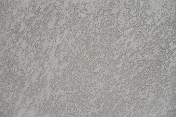 Close-up of a gray concrete wall with abstract pattern for texture or background.gray rough cement wall texture background