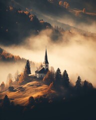 A photo of a church situated on a hill and obscured by a thick layer of fog.