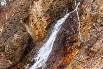 Obraz premium Scenic waterfall in slow motion flow