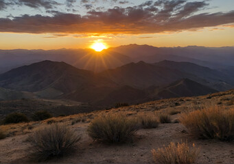 Beautiful sunrise over the mountain range at the west
