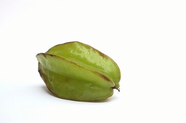 Closeup of Carambola or Star Fruit Isolated on White Background with Copy Space for Texts Writing