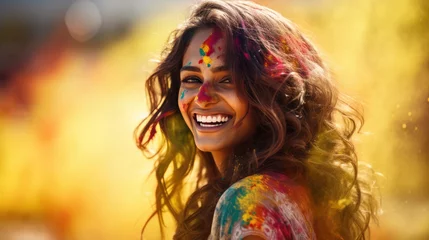 Foto op Plexiglas young woman celebrating holi festival outdoors. Fun with colours. A vibrant splash of colors © Ilmi