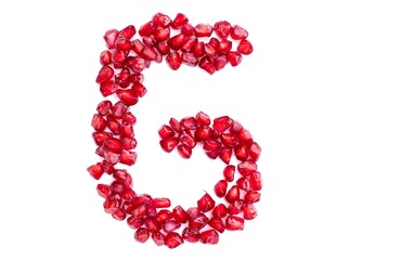 G English Alphabet Capital Letter Written with Pomegranate Seeds Isolated on White Background