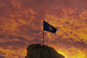 3d rendering of waving Kosovo flag on rocky landscape to celebrate the independence day of 17 February