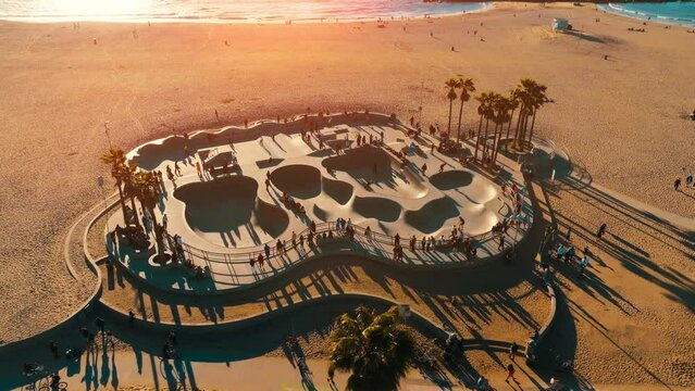Drone footage over the bike path and skate park in Venice beach California. 