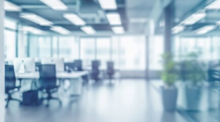Fototapeta premium Blurred empty open space office. Abstract light bokeh at office interior background for design.
