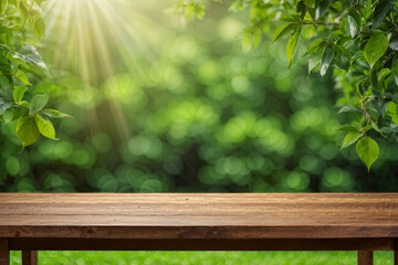 blurred green leaves background with wooden table for product.