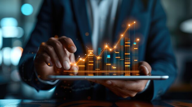 Holding a tablet, a businessman examines bar graphs illustrating analytics and finances, showcasing investments in stock markets, funds, and digital assets.