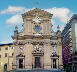 Fototapeta na wymiar baroque facade of the church of saints gaetano and michele in florence by day vertical