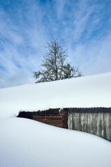 Image from Anfinnseter summer farms of the Totenaasen Hills, Norway, in wintertime.