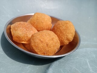 Pani Puri, Golgappe, Chat item, India dry Puri use full for Pani Puri Panipuri or Golgappa is a common street snack from India. It's a round, hollow puri filled with a mixture of flavoured water