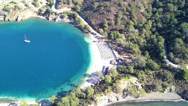 Breathtaking Boncuklu Bay: Drone Video of Stunning Beach with Sunbeds in Fethiye, Turkey