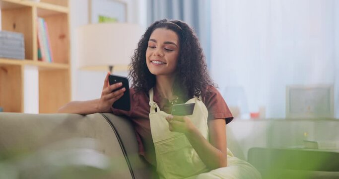Young woman, smartphone and credit card on sofa with online shopping and ecommerce on mobile app. Person, happy and phone payment with fintech and iot for digital banking and technology in apartment