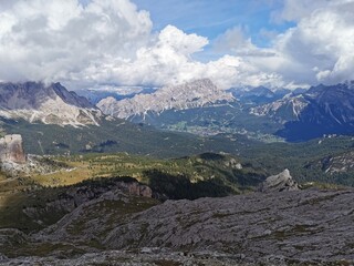 Fototapeta na wymiar Panoramic view of the mountain landscape in the alps, Averau Mountains, peak at Averau-Nuvolau, Dolomites, Italy