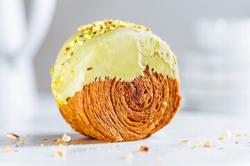 Fusion croissant called Cromboloni invented in New York. Round puff pastry filled with cream, and...