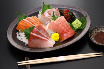 assorted sashimi; tuna(medium fatty), salmon, yellowtail, and sea bream. authentic Japanese dining.