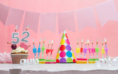 Background date of birth number  52. Anniversary. Beautiful festive background with candles for a...