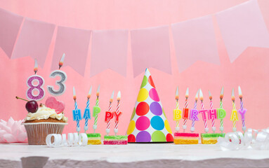 Background date of birth number  83. Anniversary. Beautiful festive background with candles for a...