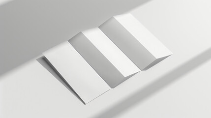 A crisp and pristine blank trifold leaflet mockup is showcased on a bright, minimalist surface, highlighting its ample design space and premium paper quality. Ideal for showcasing design con - obrazy, fototapety, plakaty