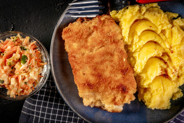 Fried cod fillet served.