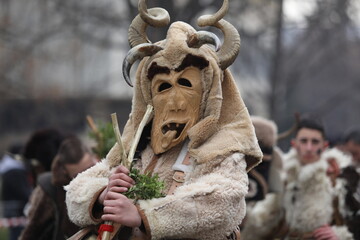 First masquerade festival "Djamala" in Kyustendil, Bulgaria. People with mask called Kukeri dance and perform to scare the evil spirits.