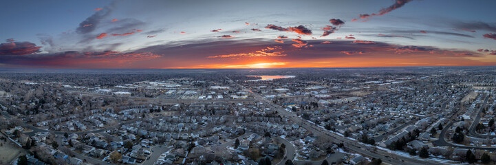 winter sunrise over city of Fort Collins and plains in northern Colorado, aerial panorama