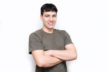 Happy young guy, college student, happy to start his first job, feeling mature and independent. The...