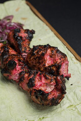 Obraz premium a delicious meat dish of Asian cuisine in a restaurant or pub. Close-ups