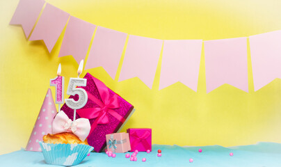 Date of birth with cake and number  15. Colorful card happy birthday for a girl. Copy space....