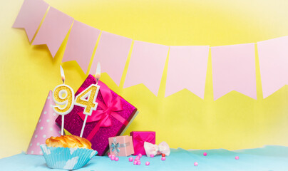 Date of birth with cake and number  94. Colorful card happy birthday for a girl. Copy space....